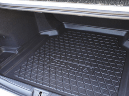 Какой багажный коврик выбрать