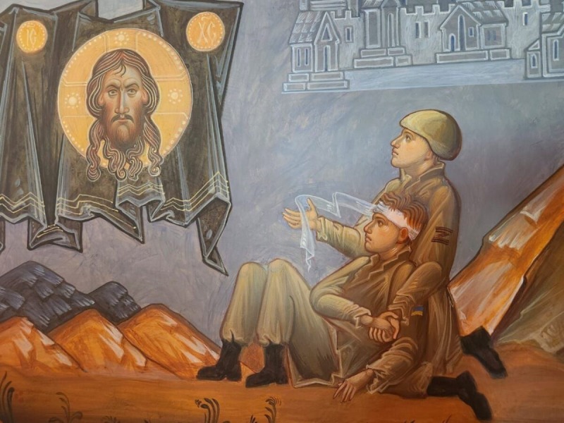 В Валааме к визиту Путина повесили фреску, на которой оккупант перевязывает раненого украинского бойца