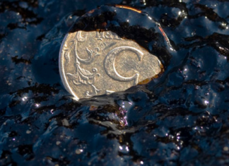 Reuters: Прибыль «Роснефти» за 9 месяцев упала на 70%