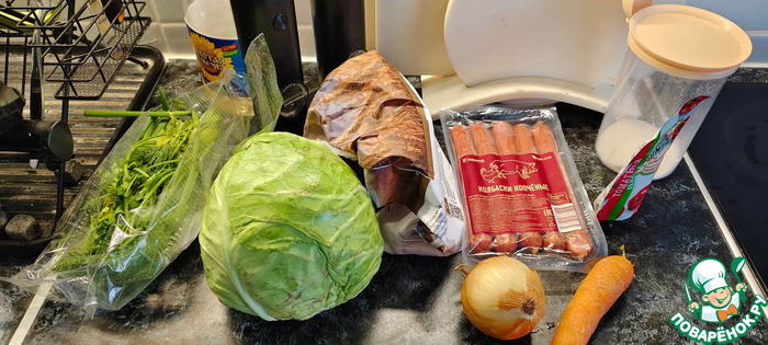 Тушеная капуста с копчёными колбасками
